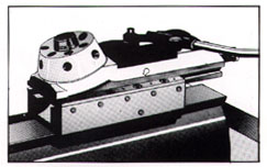 The turret tailstock on the Cyclematic CTS-27 second operation lathe.