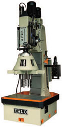 Erlo production drill press with multi spindle head and automatic cycles.