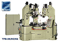 Erlo custom designed multi spindle drill press with indexing table.
